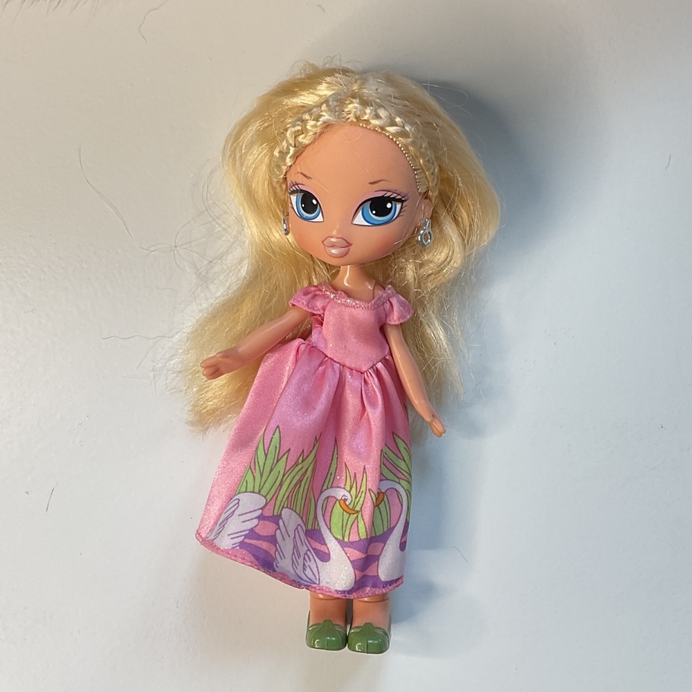 Elegant Blonde Doll in Pink Swan Dress